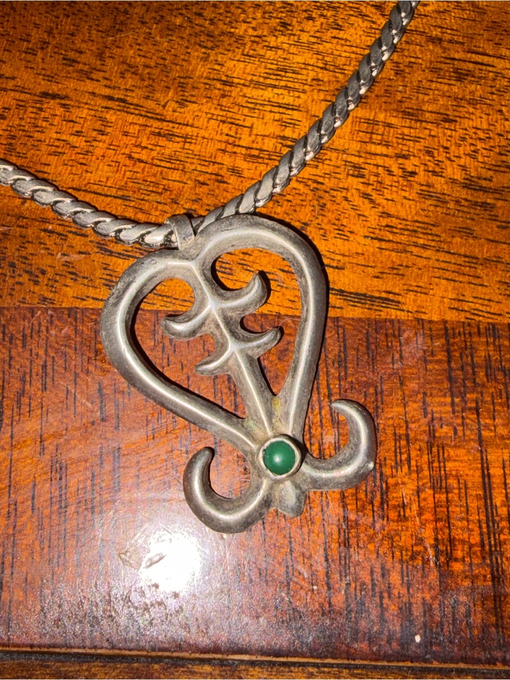 Navajo Tufa Cast & Sterling Silver Naja signed pendant